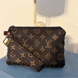 repurposed louis vuitton wristlet